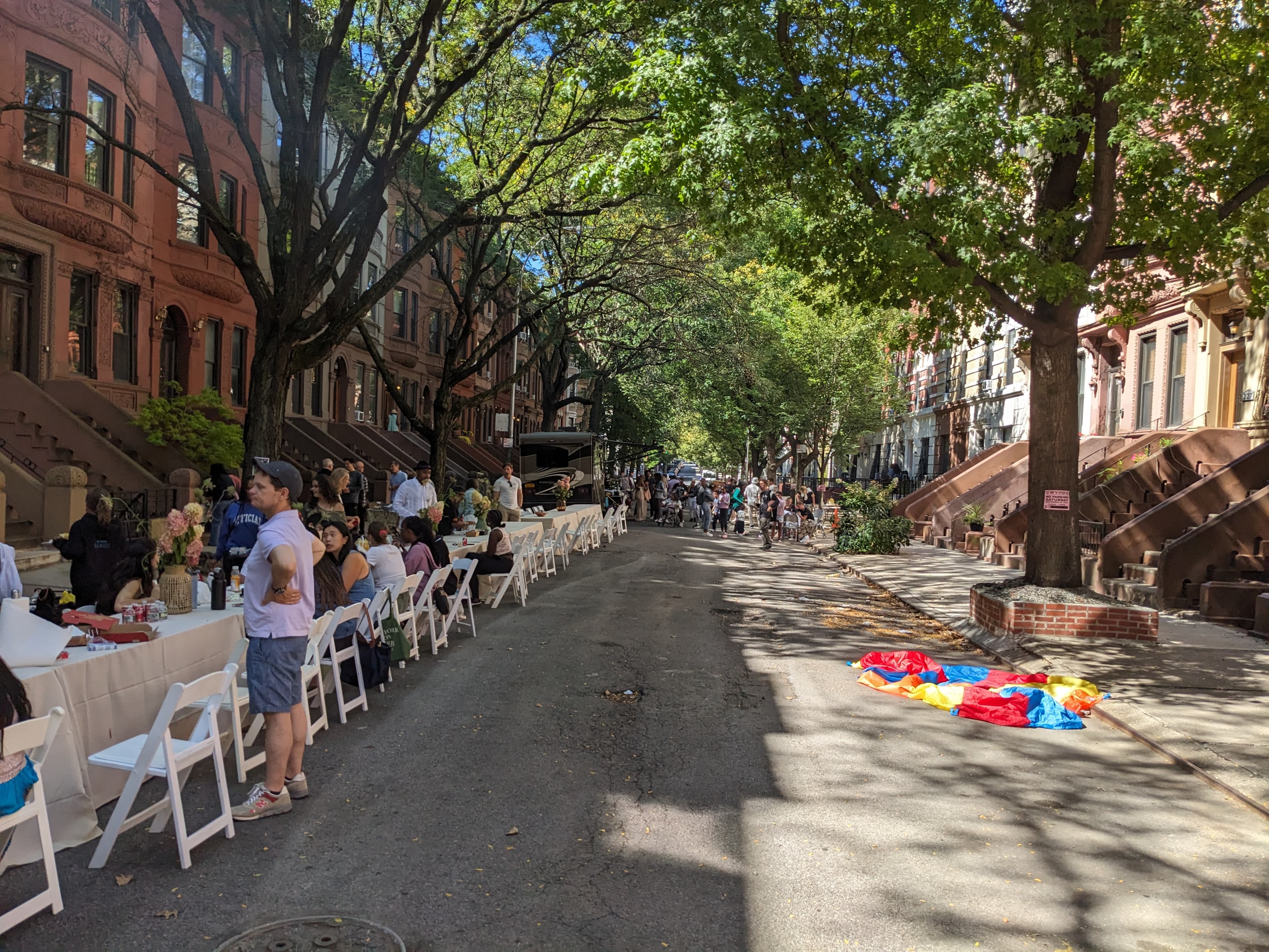 Neighbors gathering at a past 137th Street block party